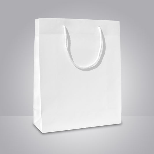 weiße papiertragetasche mit baumwollkordeln